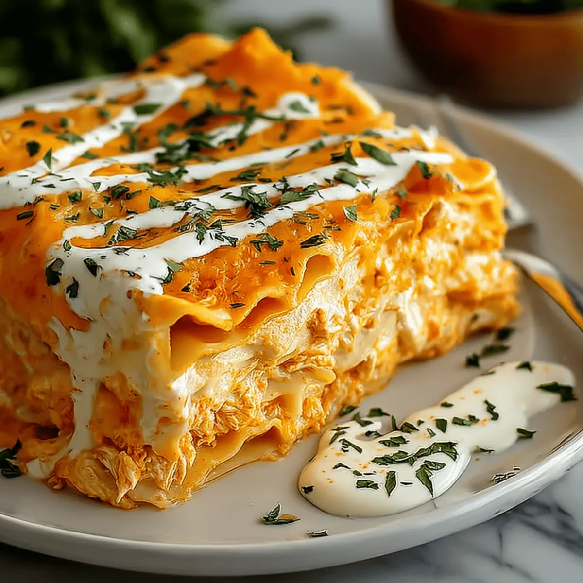 Cheesy Buffalo Chicken Lasagna with Ranch Drizzle