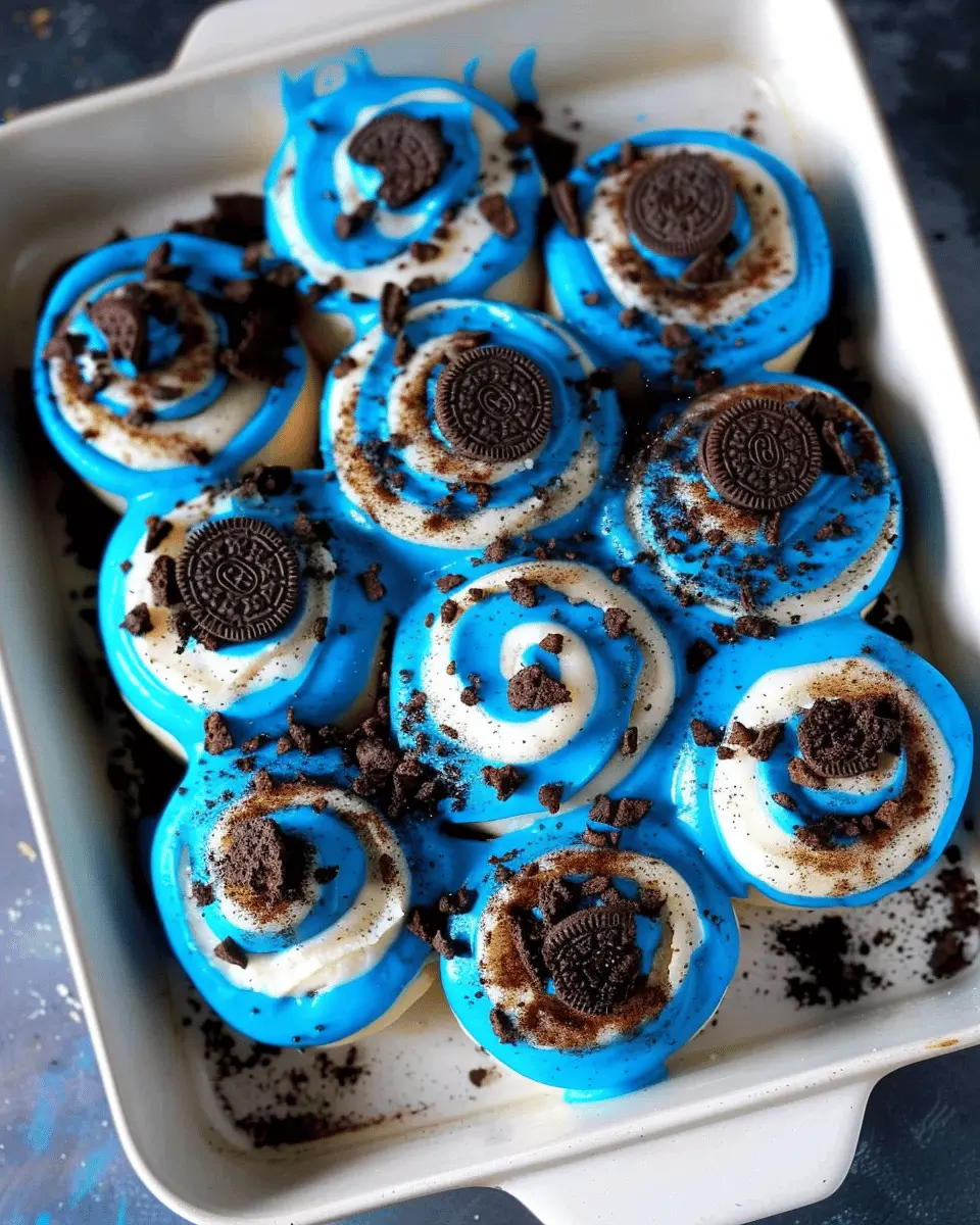 Blue Cookie Monster Cinnamon Rolls with Oreo Crumbles and Creamy Icing